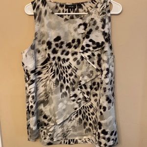 Woman’s black and white print blouse